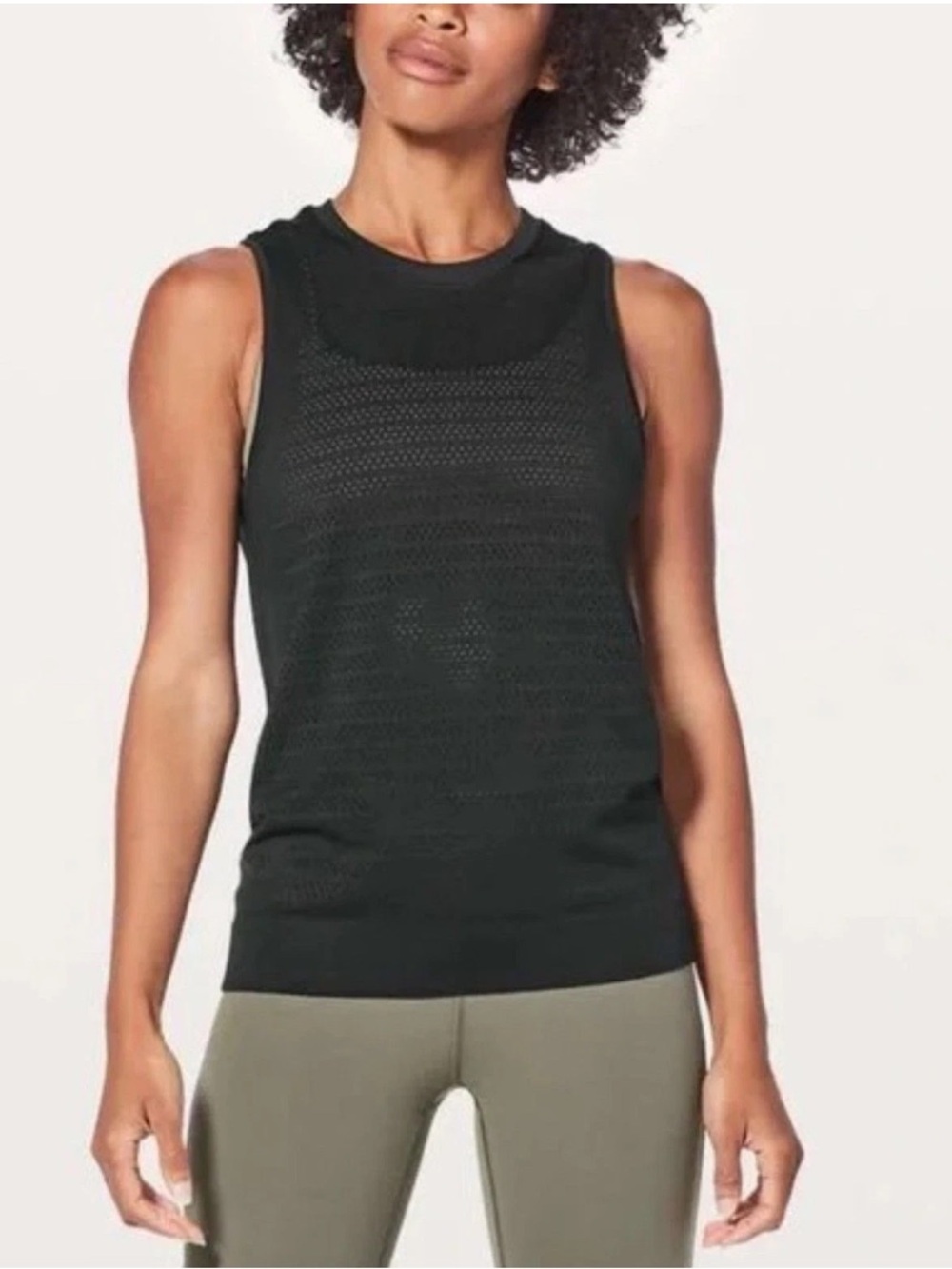 Lululemon Breeze By Muscle Tank II
Black S Relaxed Athletic Perforated Workout